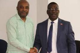 Ministre Nesmy Manigat et M. Dorminvil 